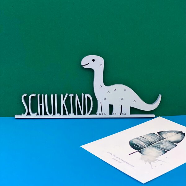 Schulkind mit Dinosaurier